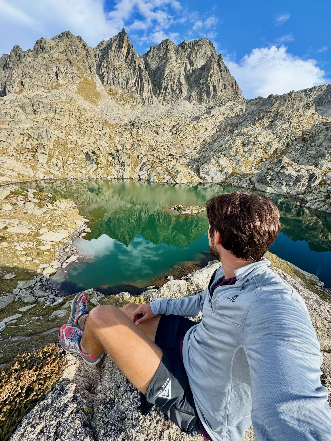 Shawn overlooking a mountain lake